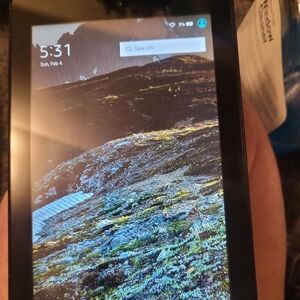 This lot includes two tablets and keyboard